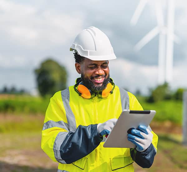 Man in office chair leaning back